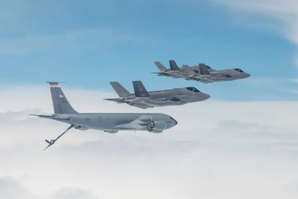F35s flying in front of a KC135 Stratocaster
