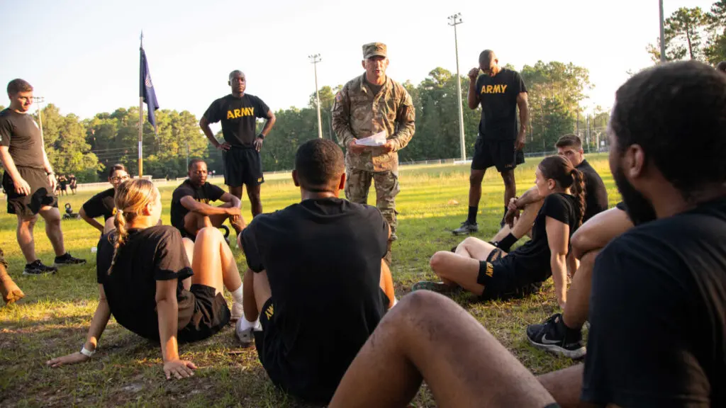 Instructor training troops on a field