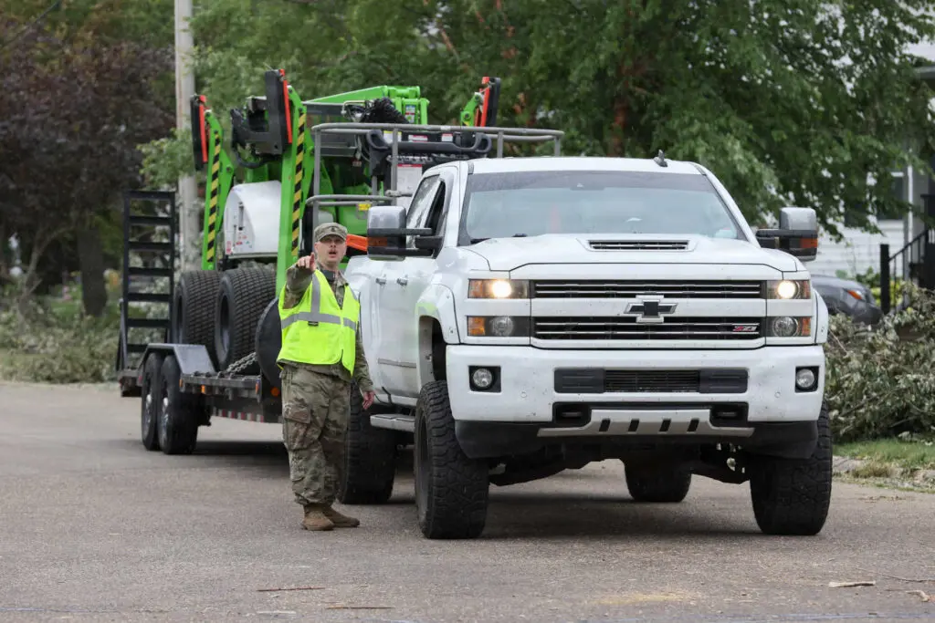 A guard member directing traffic