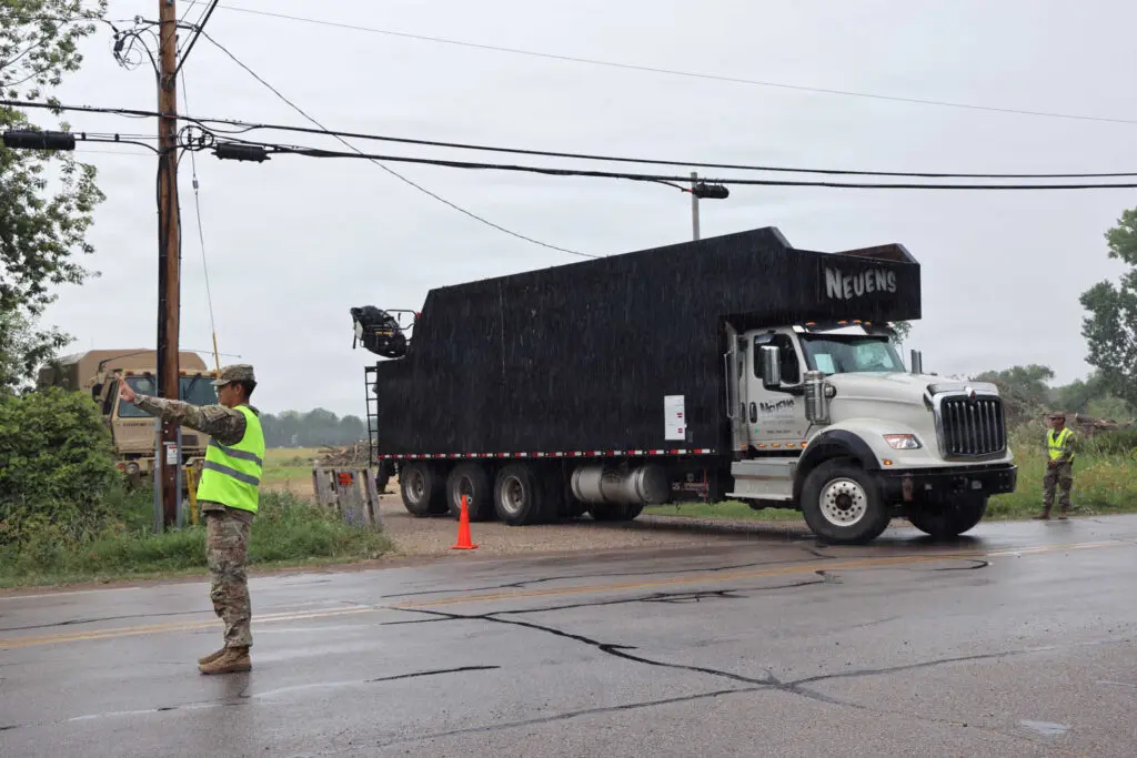 Helping trucks to get debris collections sites