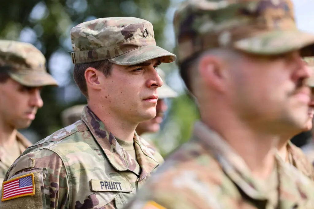 A soldier listening to a speech while at attention