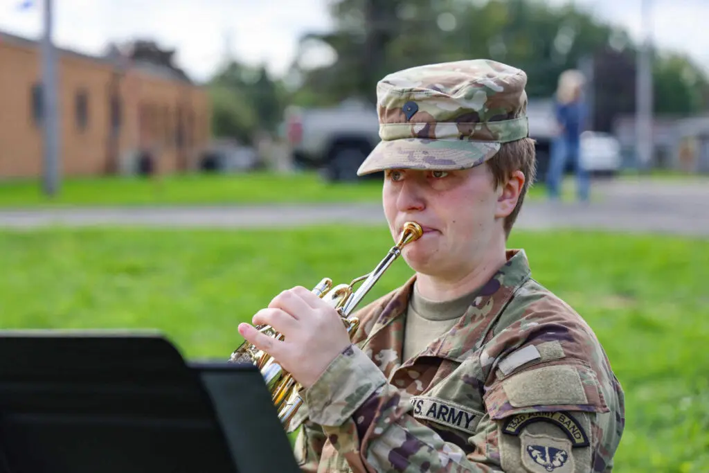 A soldier playing a trumpet