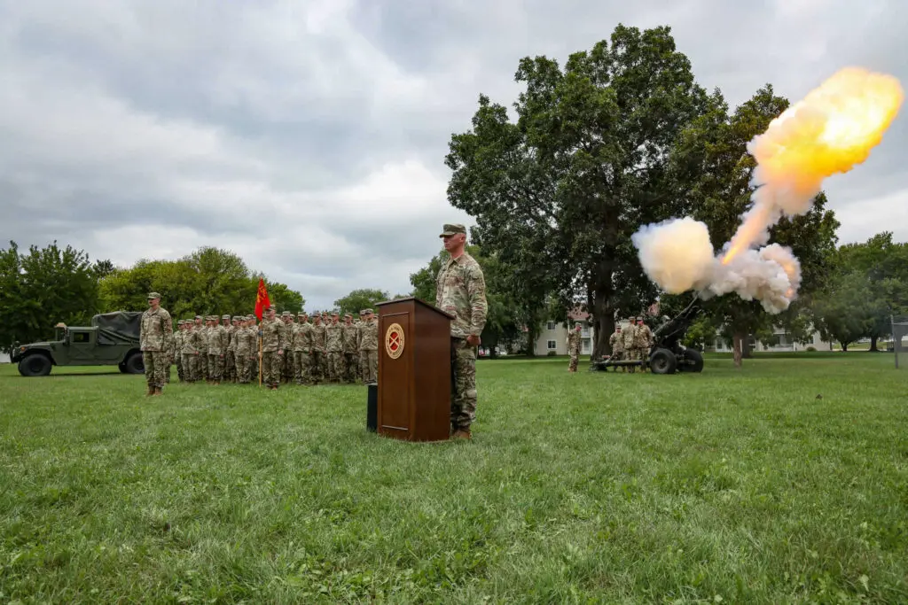 Field artillery being shot off during a ceremony