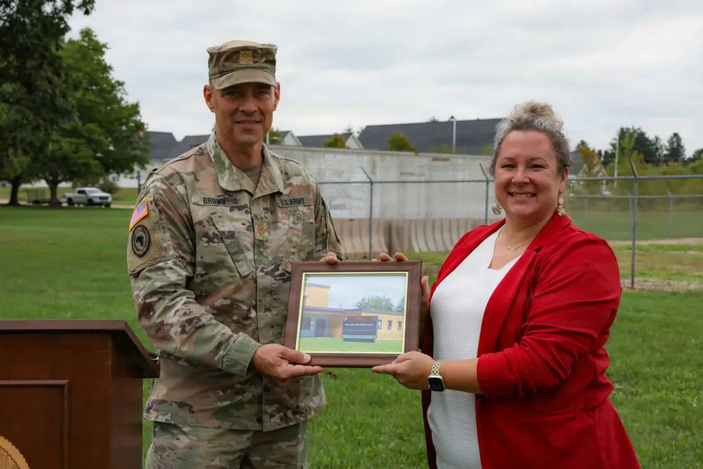 A photo being presented to the Mayor of Berlin Wisconsin