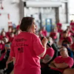 Talking in front of service members before the Refuel Resilience Walk