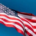 A US Flag being lowered