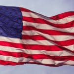 US Flag flying at half staff