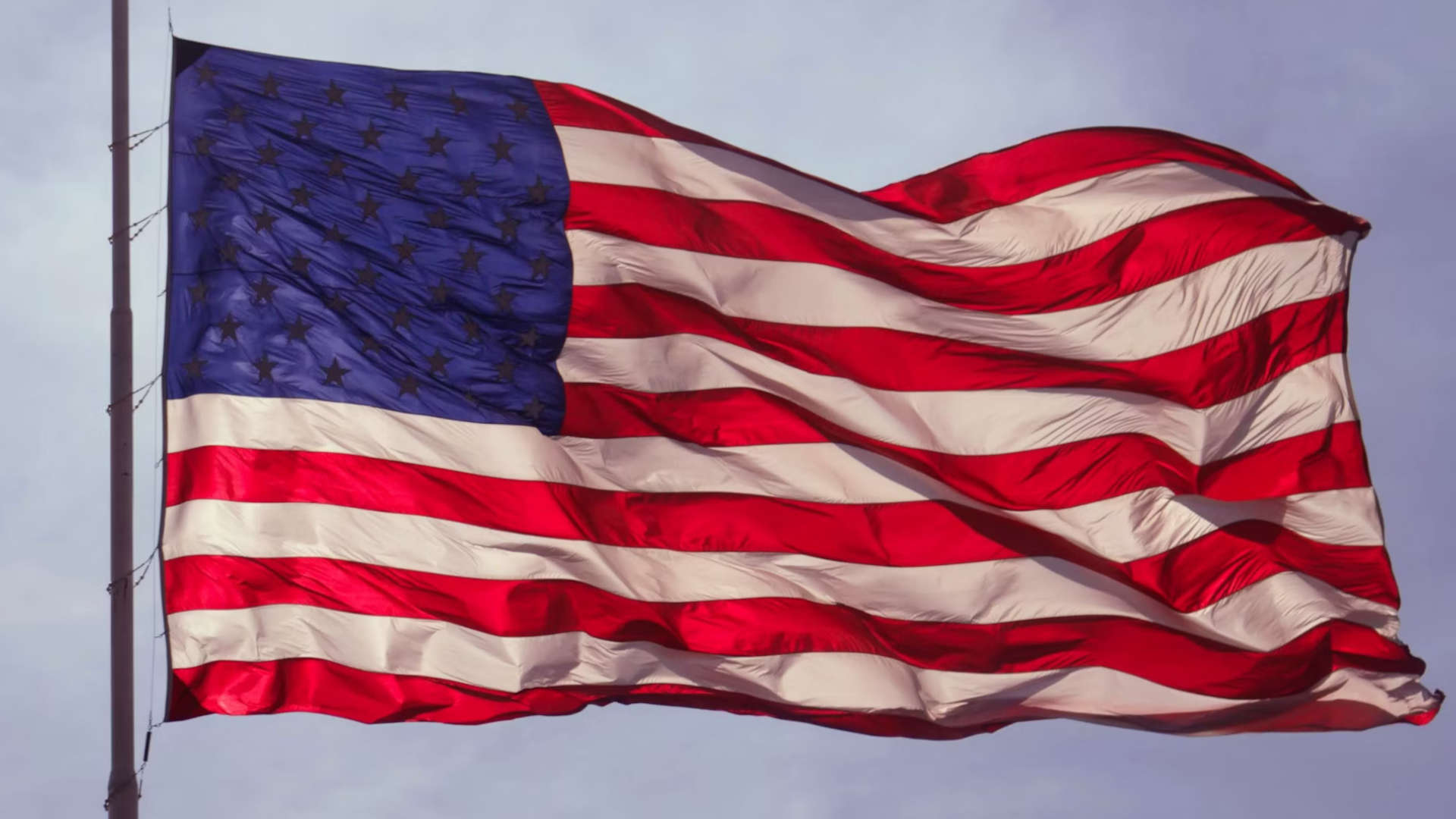 US Flag flying at half staff