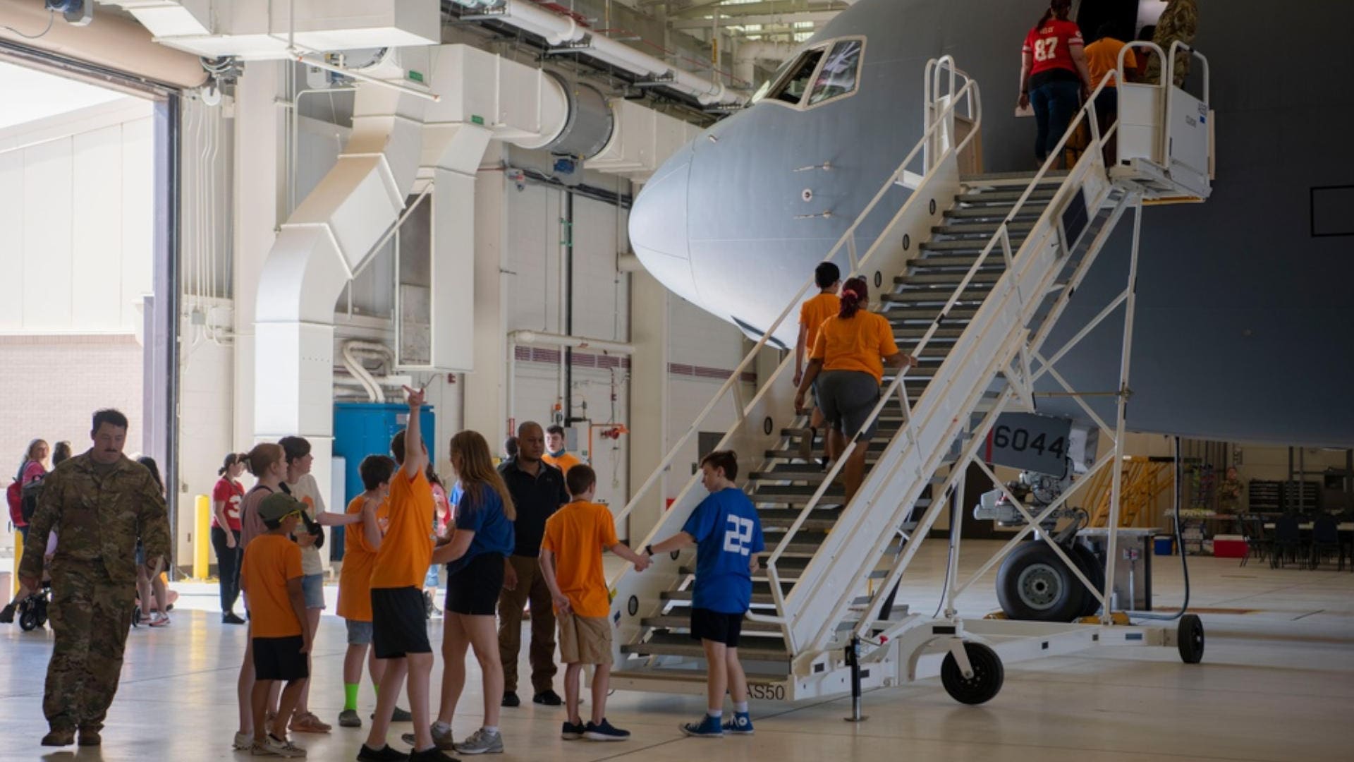 A tour walks into a plain while checking out an open house