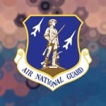 The Wisconsin Air National Guard logo on a textured background