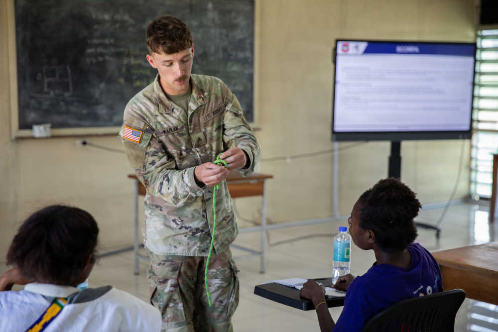 A solider showing off how to tie knots